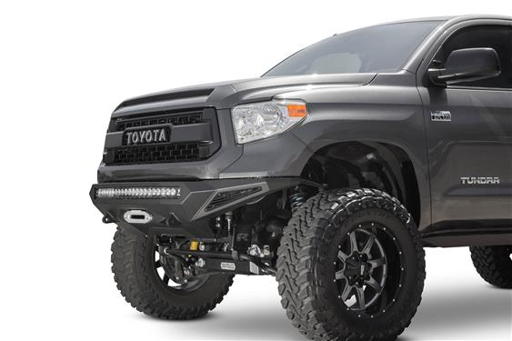 Image of a Toyota Tundra, showcasing its robust design and features in a natural outdoor setting.